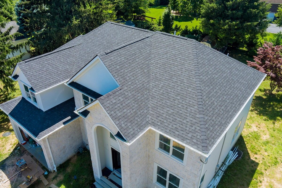 arial view of a home with shingles