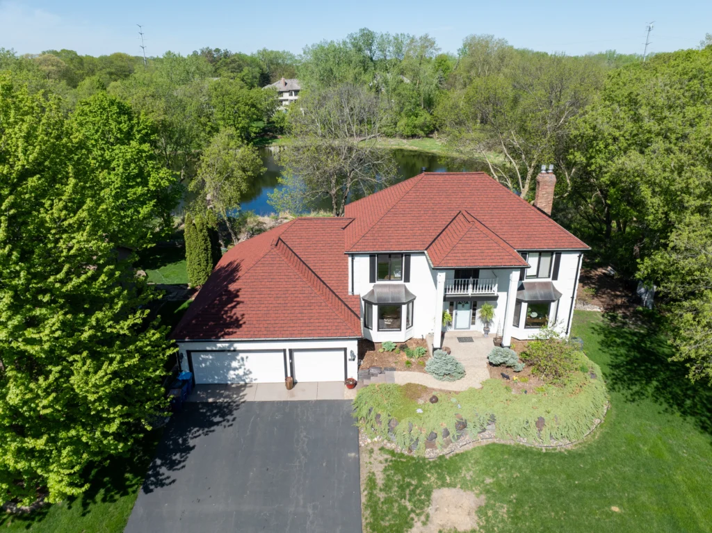 Aerial view of a completed roofing project